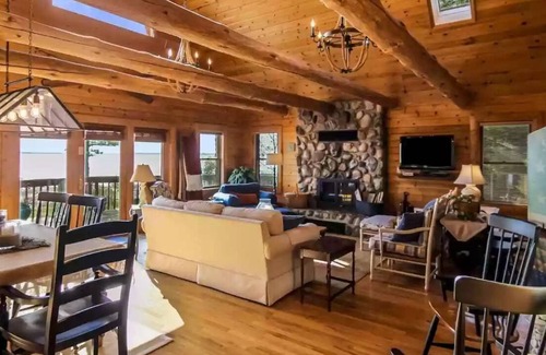 Kewadin House | 100' gorgeous sandy GT bay frontage only 15 miles from TC