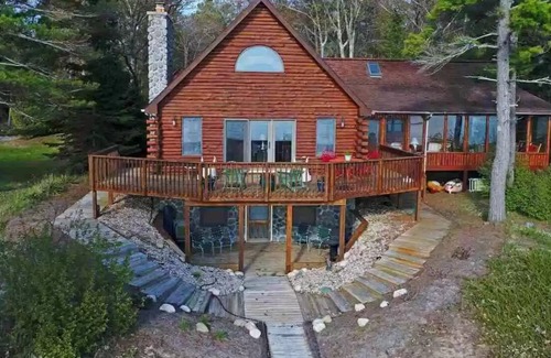 Kewadin House | 100' gorgeous sandy GT bay frontage only 15 miles from TC