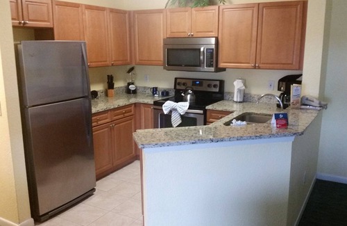 Florida Central Atlantic Coast Condo | 1043 Dollars Near Disney! LARGE 2-BEDROOM CONDO, W/D, PORCH, WHIRLPOOL TUB