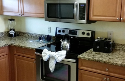 Florida Central Atlantic Coast Condo | 1043 Dollars Near Disney! LARGE 2-BEDROOM CONDO, W/D, PORCH, WHIRLPOOL TUB
