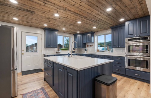St. Charles Apartment | 11 cabins! Hot tub! Family Reunion! Business Retreat! Sleeps 50+