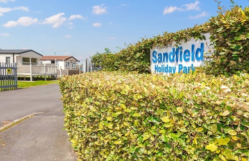 Chapel Saint Leonards House | 12ft-wide stylish and comfortable caravan with one double and one twin.