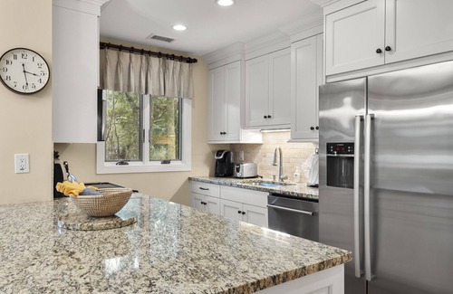 West Beach Village Condo | 1328 Fairway Oaks: 4BR with Golf Views, Close to Beach, Beach Gear/Bike Credit