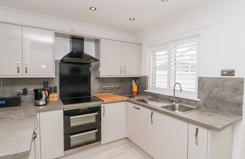 Seaton Cottage | 14 LYME MEWS, pet friendly, with a garden in Seaton, Devon