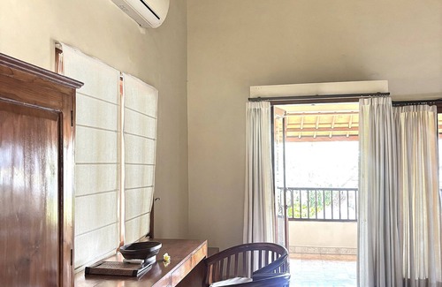 Dewi Sri Villa | 16 Bedroom Villa Riverside Legian
