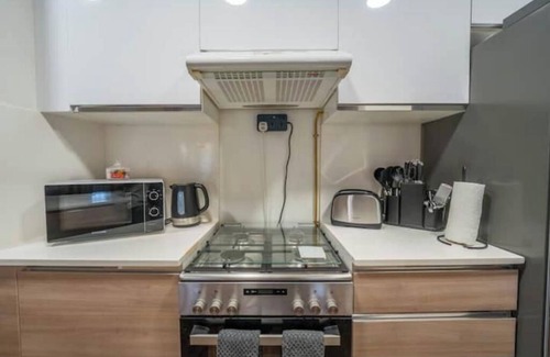 Dubai Production City Condo | 1BHK Luxury Serviced Apartment - Al Andalus JGE