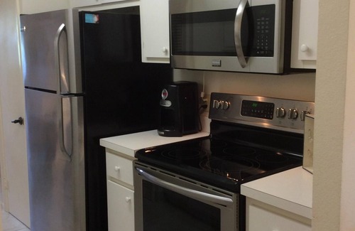 Whitney Beach Condo | 1st Floor Home Away from Home - Steps to Beach - Pool