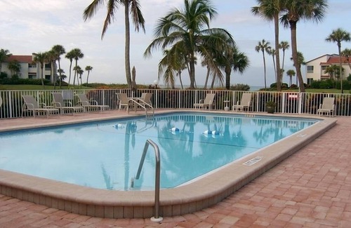 Whitney Beach Condo | 1st Floor Home Away from Home - Steps to Beach - Pool