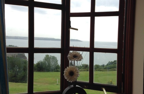 Saint Austell Bay Cottage | 2 bed Cornish cottage with panoramic views of St Austell Bay. Golf on doorstep.