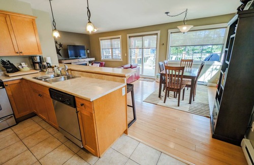 Golden Condo | 2-bedroom condo with hot tub and mountain views