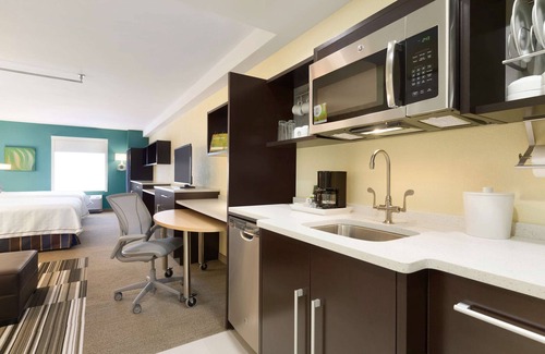 Biggs Field Apartment | 2 Connecting Suites at a Hotel