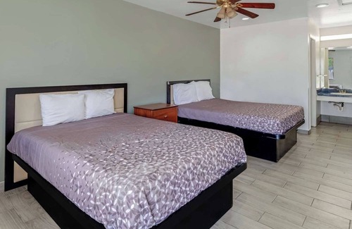 Eastside Promise Neighborhood Hotel | 2 Cozy Rooms Offering Free Breakfast & Easy Access to Local Attractions