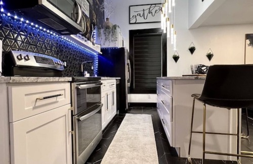 Clearwater House | 2 homes next to each other.Heated Pool, Spa & Backyard Games! SLEEPS 23 people!