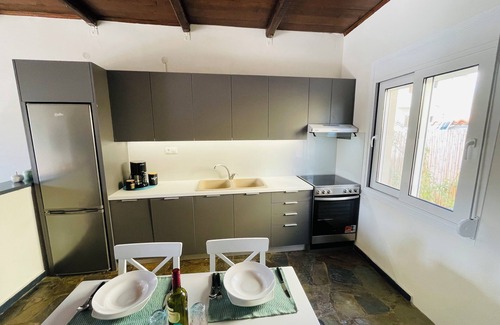 Kokkini Chani House | 2 min. drive to the beach. Holiday Home Angela
