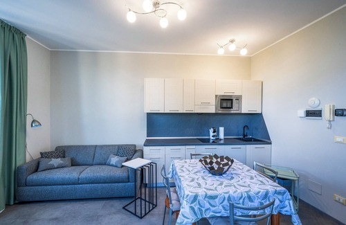 Carciano Apartment | 2-room apartment with terrace and garden in an Art Nouveau villa with communal pool