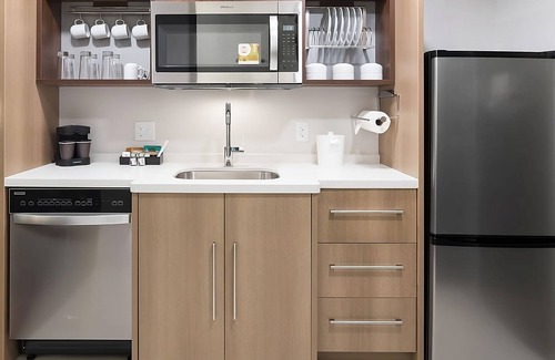 Airport North Hotel | 2 Units | Spacious Hotel Suite near MCO | Kitchenette | Gym