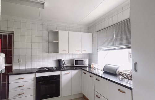 Greater Johannesburg Metropolitan Area Cabin | 207 Main Ave