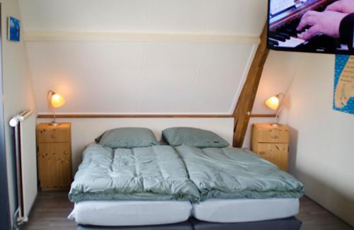Den Burg Bed & Breakfast | 22up Bed & Koffie