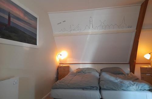 Den Burg Bed & Breakfast | 22up Bed & Koffie