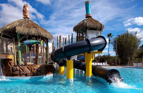 West Kissimmee Condo | 2BDRM~ Liki Tiki Village Resort ~ 64 ACRE RESORT- WAVE POOL, SLIDES, LAGOON