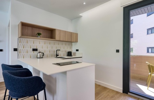 La Buhaira Apartment | 2BR/2BA Apt, Elevator, Workspace & Free Parking