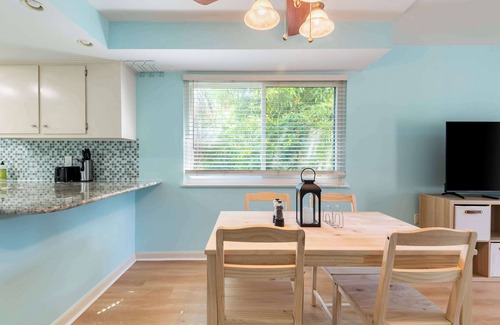 Indian Harbour Beach Condo | 2BR Stylish Retreat with BBQ, Pool & Beach