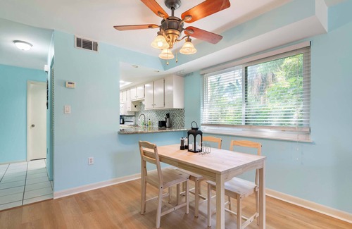 Indian Harbour Beach Condo | 2BR Stylish Retreat with BBQ, Pool & Beach