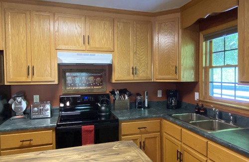 Maggie Valley Cabin | 3/2 Log Cabin with year round rushing creek. Hot tub, wifi, A/C, arcade game.