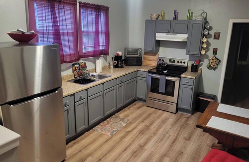 Saint Claude House | 3 bedroom 2 bath Musicians Village Flat