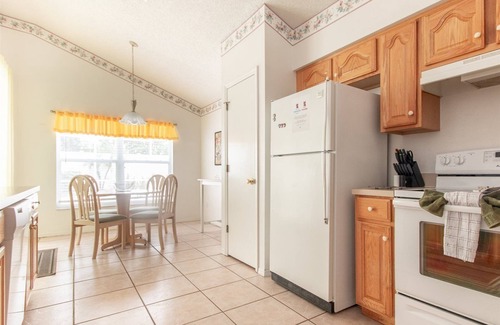 Chatham Park House | 3 Bedroom Home with Private Screened Pool with Rock Waterfall Feature and Gameroom by Florida Dream.