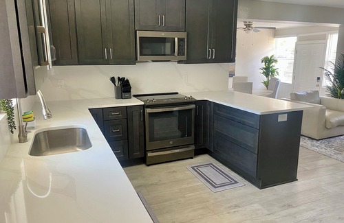 Arlington House | 3-bedroom house in Jacksonville with fenced backyard and screen enclosed pool.