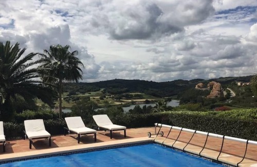 San Roque Villa | 3 bedrooms, 3 bathrooms, private heated pool, garden area and golf course views