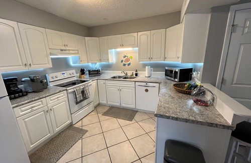 North Carolina Coast Cottage | 30 Sec. to Beach, Sun, Sand & Waves & a Family & Pet Friendly Fenced Backyard