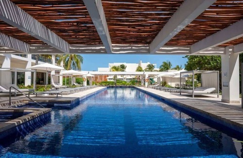 Punta Sam Apartment | 3BR Beachfront Luxury Condo with Great Features