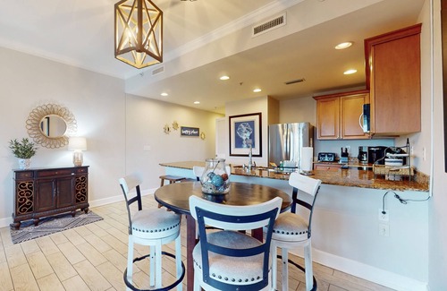 Upper Grand Lagoon Condo | 3rd-floor beach & pool-view condo with outdoor pool, hot tub, grills, balcony