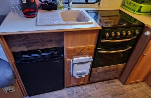Gravesend Other | 4 berth caravan in a garden, nestled in the trees