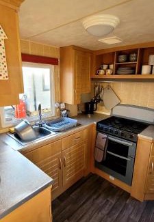 Chapel Saint Leonards Apartment | 4 Berth Static Caravan Golden Palm Resort with Decking
