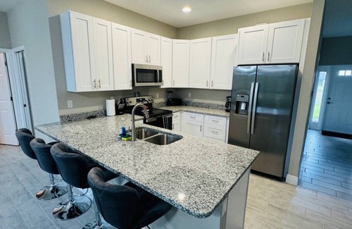 Burnt Store House | 4 King Bedroom Home with Large TVs in All Rooms - Brand New Home!