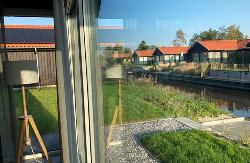 Anjum House | 4-person chalet Albatros by the water with parking space