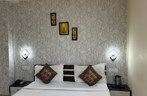 Varanasi Hotel | 45-room hotel in delightful Varanasi with WiFi, AC. Unwind in comfort