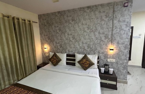 Varanasi Hotel | 45-room hotel in delightful Varanasi with WiFi, AC. Unwind in comfort