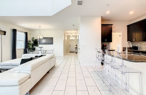 Kissimmee House | 4809 - 5 Bedroom Pool Home Overlooking Pond in Storey Lake Resort Under 10 Minutes to Disney
