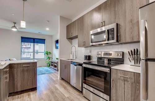 Downtown Louisville Apartment | 4th Street Suites - Extravagant King Bed Suite