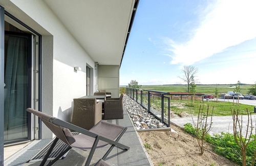 Ostseebad Wustrow Apartment | 5-star Waterkant vacation apartment with west-facing terrace and 2 bedrooms.