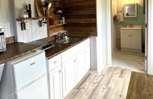 Avon Apartment | 500ft from Avon beach in an art gallery! Fish, kite board, surf & throw pottery
