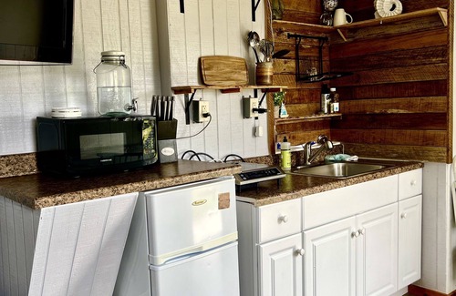Avon Apartment | 500ft from Avon beach in an art gallery! Fish, kite board, surf & throw pottery