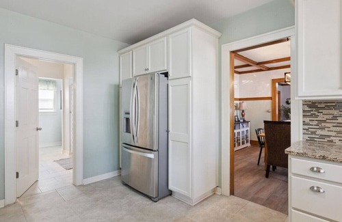 John Ball Park Apartment | 5BR/3BA Near Downtown & Medical Mile Fenced Yard