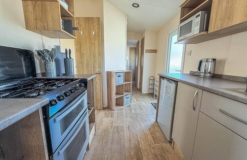 Felixstowe House | 6 berth caravan with decking at Felixstowe Beach Holiday Park ref 55038OW
