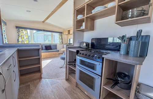 Felixstowe House | 6 berth caravan with decking at Felixstowe Beach Holiday Park ref 55038OW
