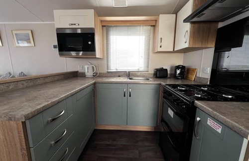 Corton House | 6 berth caravan with stunning sea views and decking to relax on, ref 32048AZ